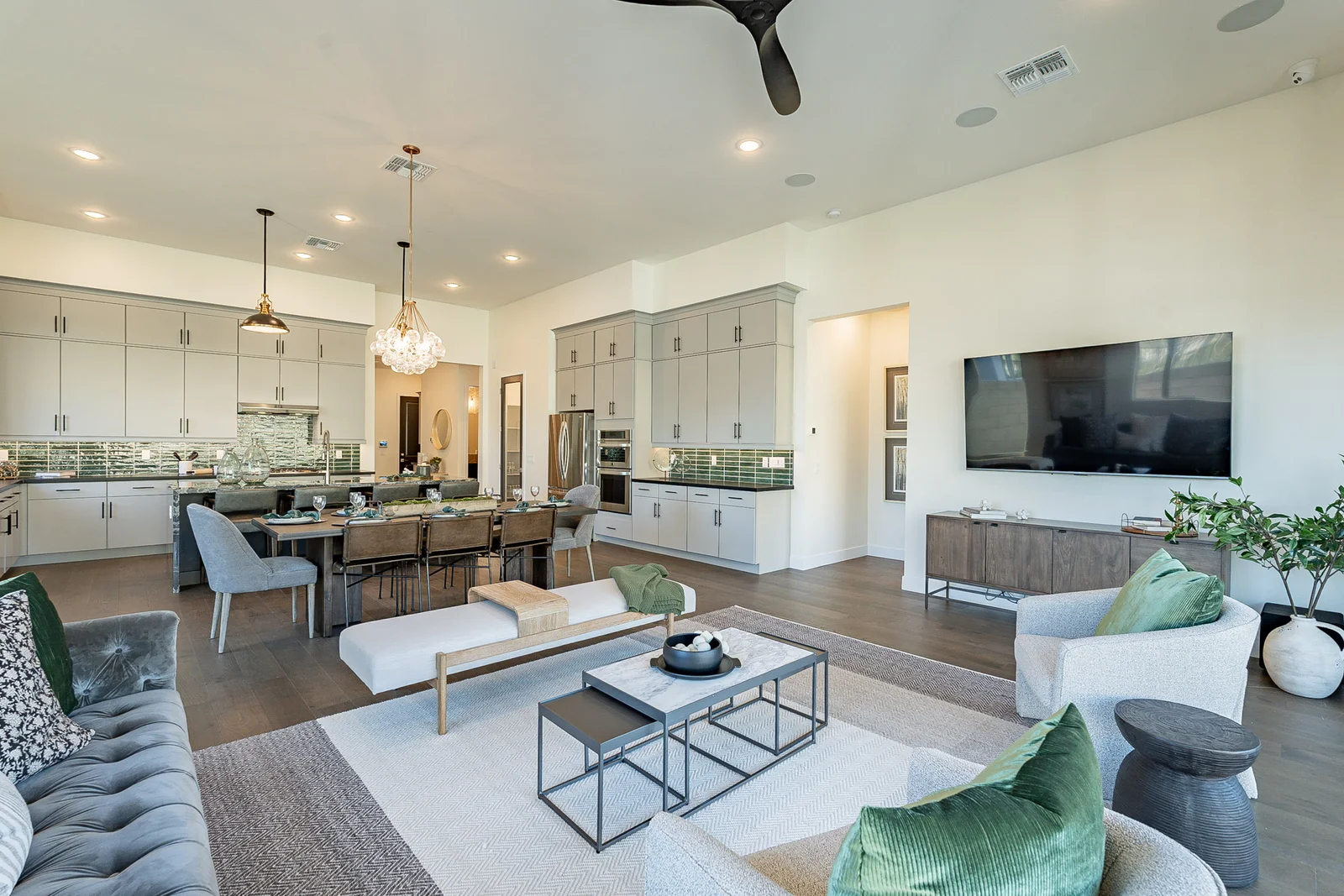 The open kitchen and living area of a move-in-ready Capital West home