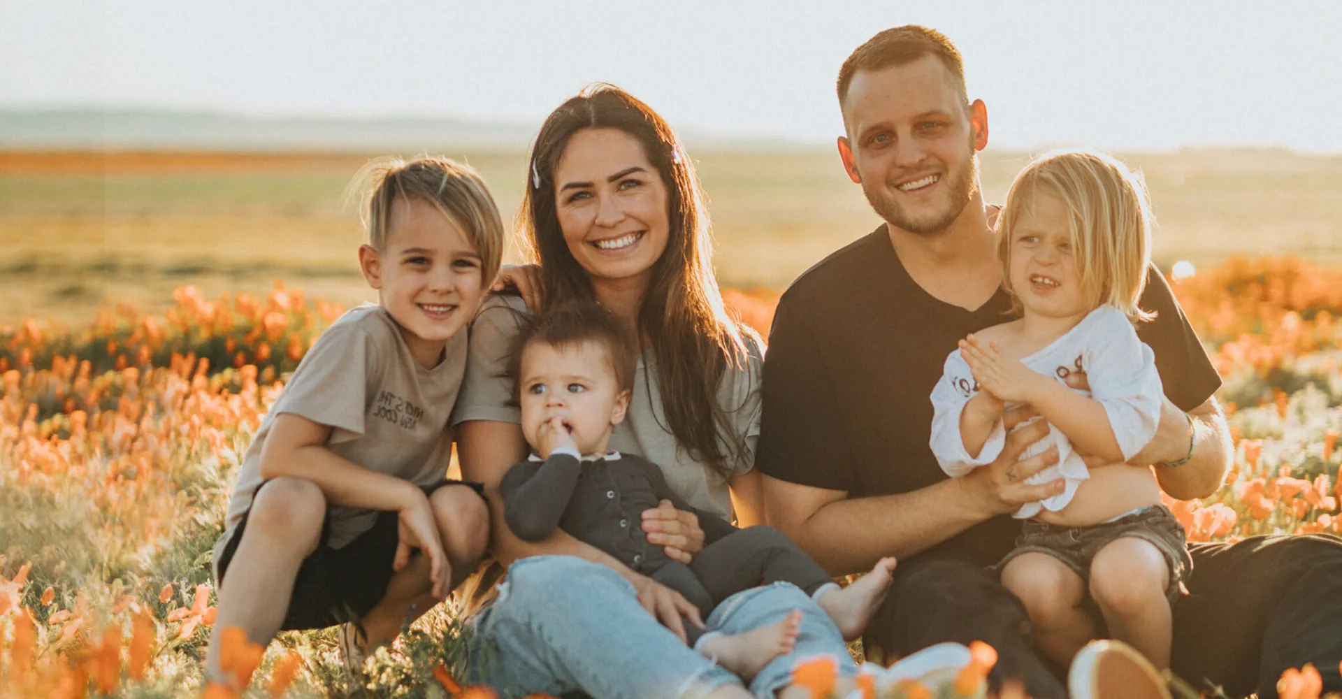 A Capital West Homes family outside their new Arizona home